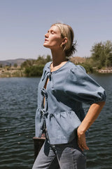 Natalia Peplum Tie Blouse In Light Wash - Final Sale