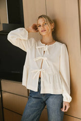 Lucie Peplum Tie Blouse In Cream - Final Sale