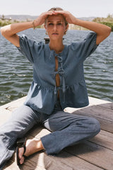 Natalia Peplum Tie Blouse In Light Wash - Final Sale